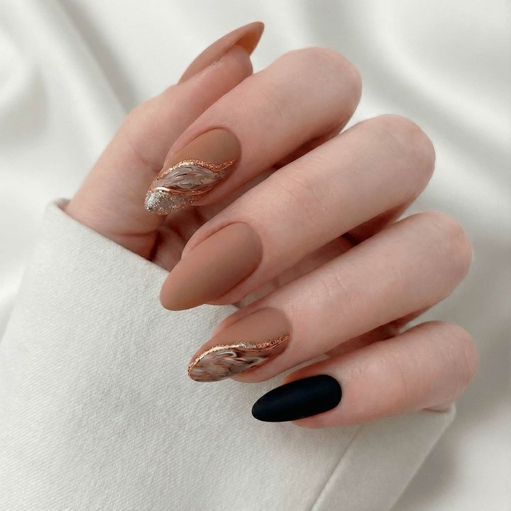 Winter Gold press-on nails — soft gold shimmer over natural base